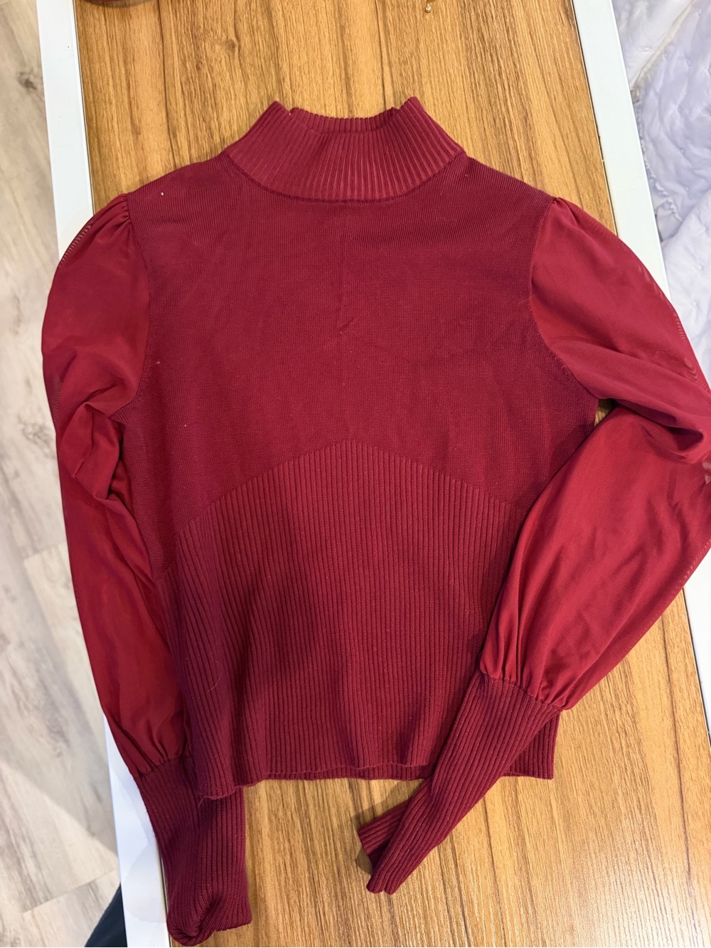 Ost Ribbed Mock Neck Sweater in Burgundy with sheer sleeves